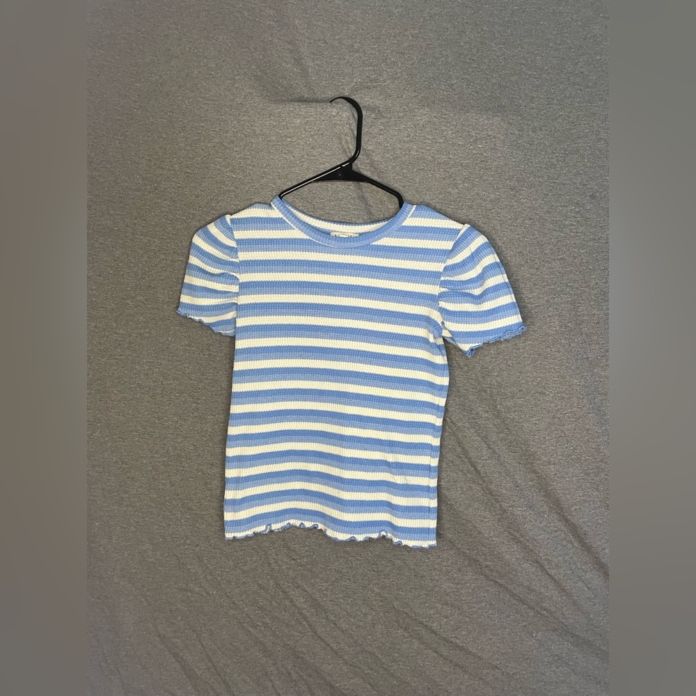 KidPik blue and white striped puff sleeve shirt.